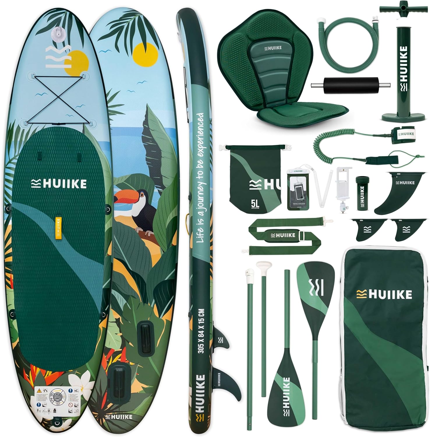 HUIIKE inflatable paddle board fully inflated on a grassy lake shore next to a camper van.